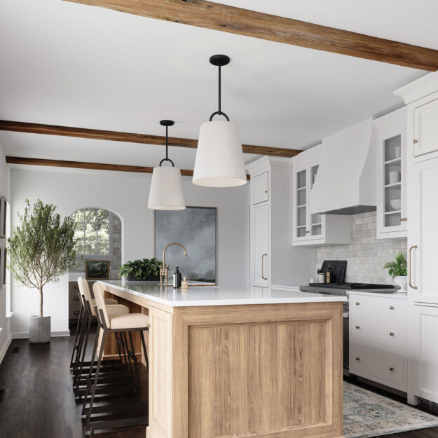 white kitchen with hanging chandeliers over island
