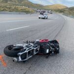 The motorcycle is shown at the crash scene. (Utah Highway Patrol)