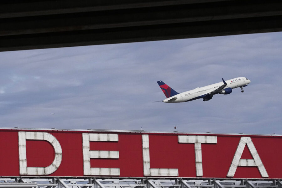 FILE - A Delta Air Lines plane takes off from Hartsfield-Jackson Atlanta International Airport, Nov...
