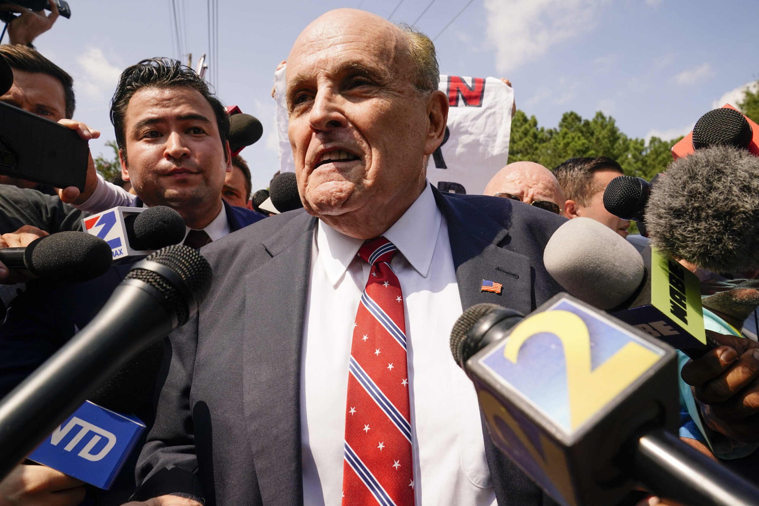 Rudy Giuliani speaks outside the Fulton County jail, Wednesday, Aug. 23, 2023, in Atlanta. Giuliani...