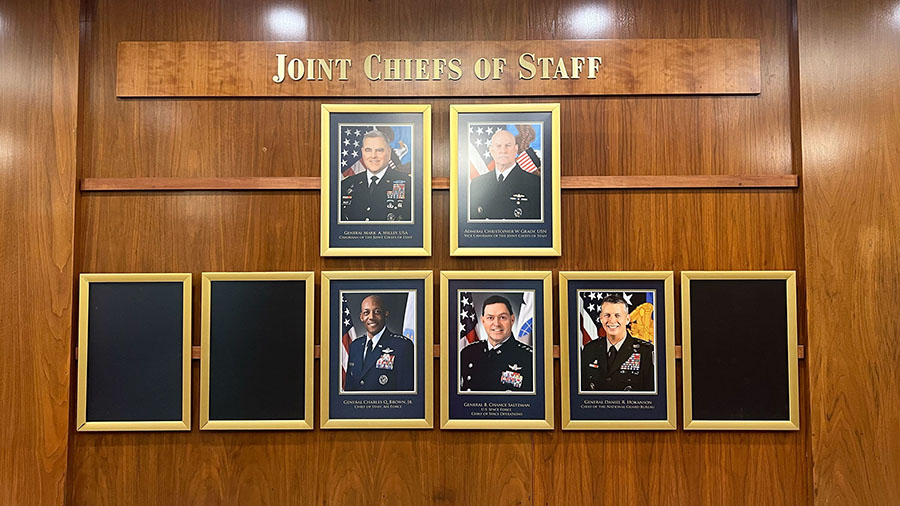 The wall at the Pentagon featuring the Joint Chiefs of Staff. Three of the positions are vacant due...