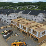 File - Townhomes under construction are shown in Mars, Pa., on May, 27, 2022. On Thursday, Freddie Mac reports on this week's average U.S. mortgage rates. (AP Photo/Gene J. Puskar, File)Credit: ASSOCIATED PRESS