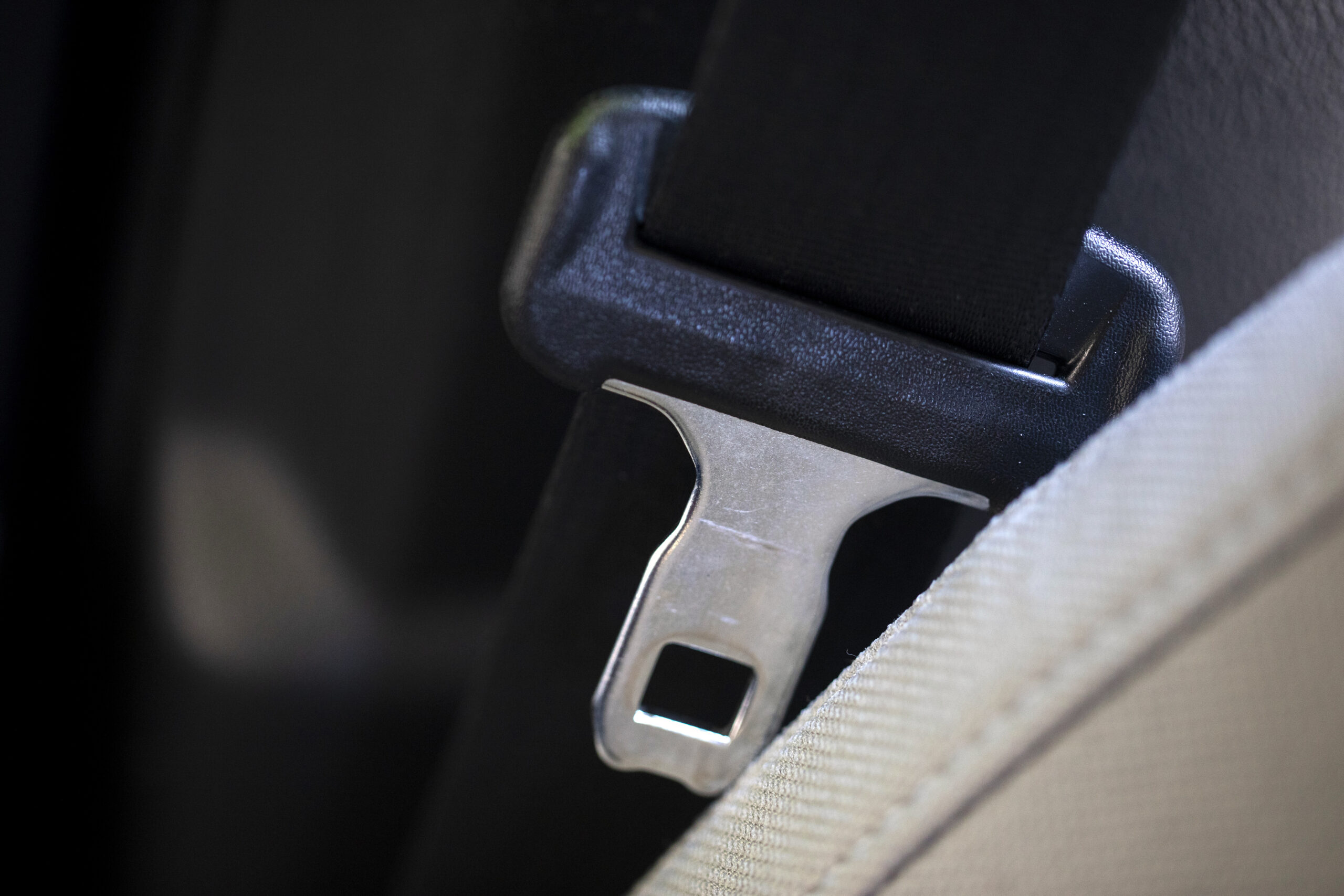 A seat belt for the right front passenger seat is shown in a vehicle on Monday, Aug. 21, 2023. The ...