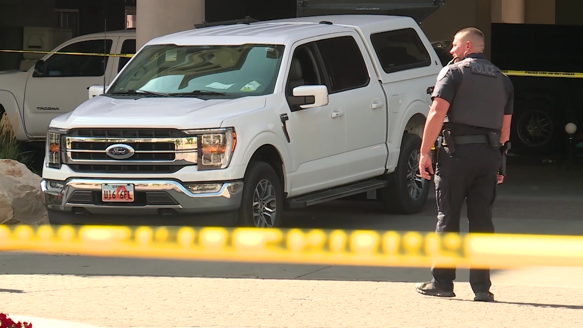 Crime scene tape and  evidence markers at Midtown 360 apartments. (KSL TV)...