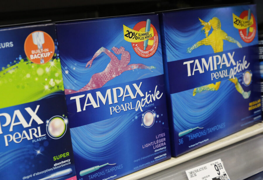 Boxes of tampons are displayed in a pharmacy in New York, March 7, 2016. New Jersey will require sc...