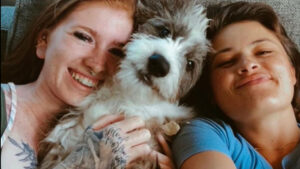 Makenna Kuykendall is shown with her partner and their dog