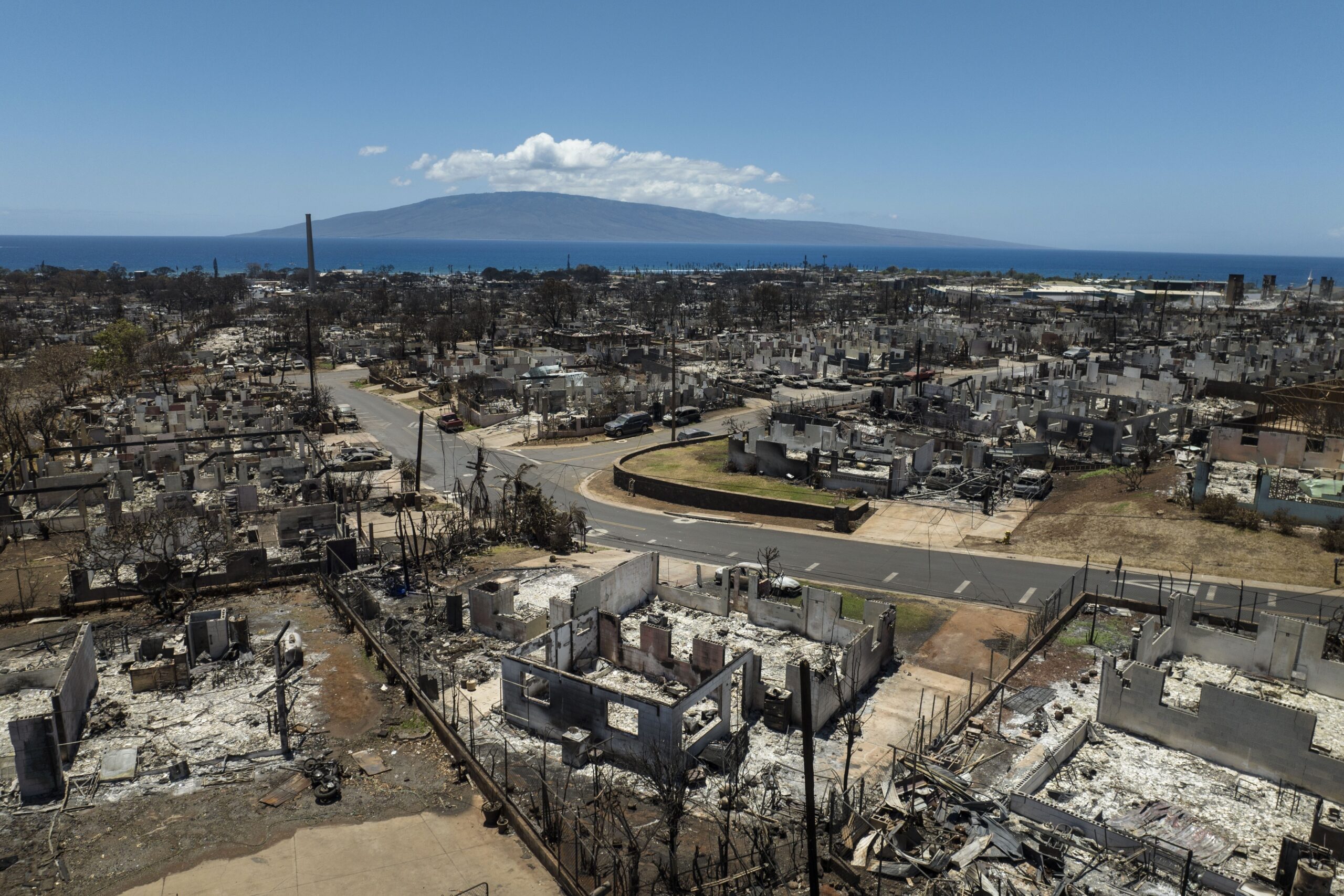 FILE - destroyed homes are visible in the aftermath of a devastating wildfire in Lahaina, Hawaii, T...