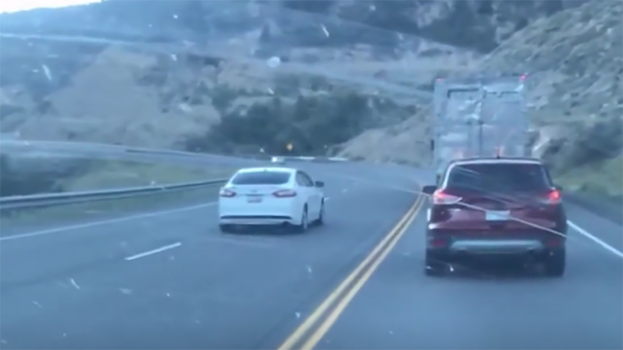 Car making an illegal pass on U.S. Highway 6...
