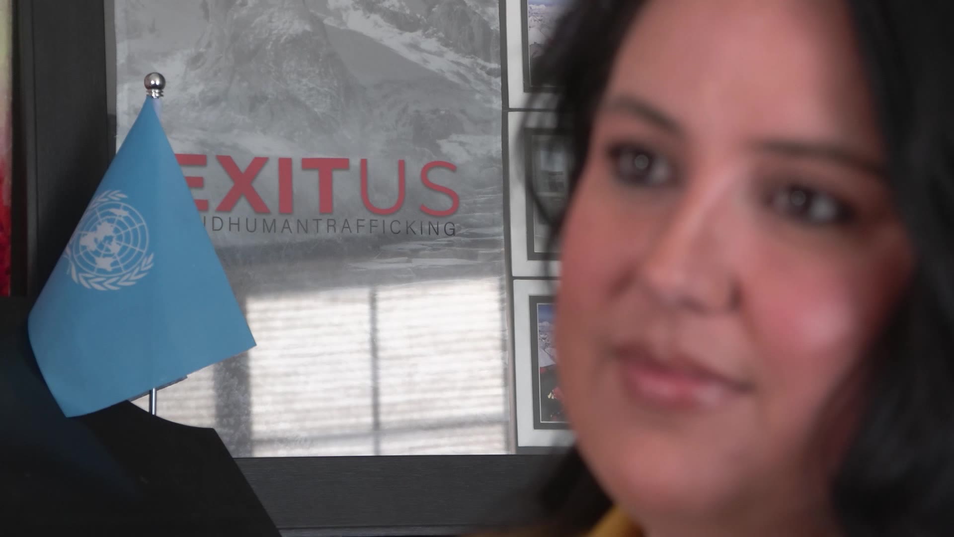 Candace Elexzandria Lierd speaking to KSL TV about the NBA All-Star Event 2023 with the Exitus logo...