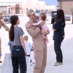 One of the returning Hill Air Force Base pilots back with their family. (Mark Less/KSL TV)