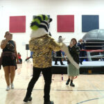 Parents and kids packed the gym at Herriman High School to watch some quality Mascot grappling Wednesday night. (KSL TV)
