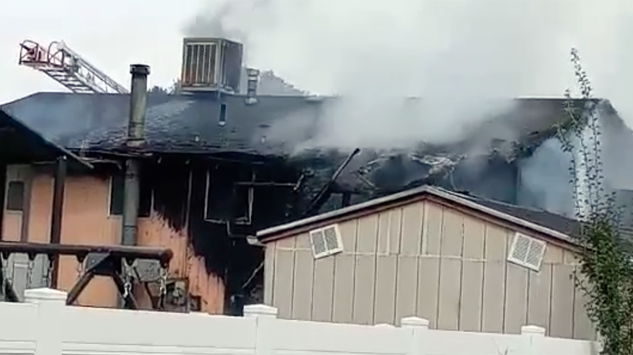 Firefighters said a propane tank exploded and started this house on fire in Ogden, Utah on Friday, ...