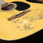 Post Malone signed a guitar to raise money for Utah Honor Flight. (KSL TV) 
