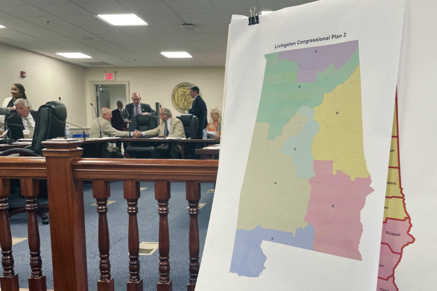 FILE - A map of a GOP proposal to redraw Alabama's congressional districts is displayed at the Alab...