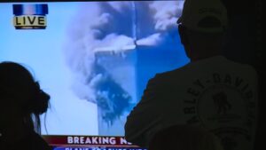 An old newscast showcasing the twin towers and 9/11
