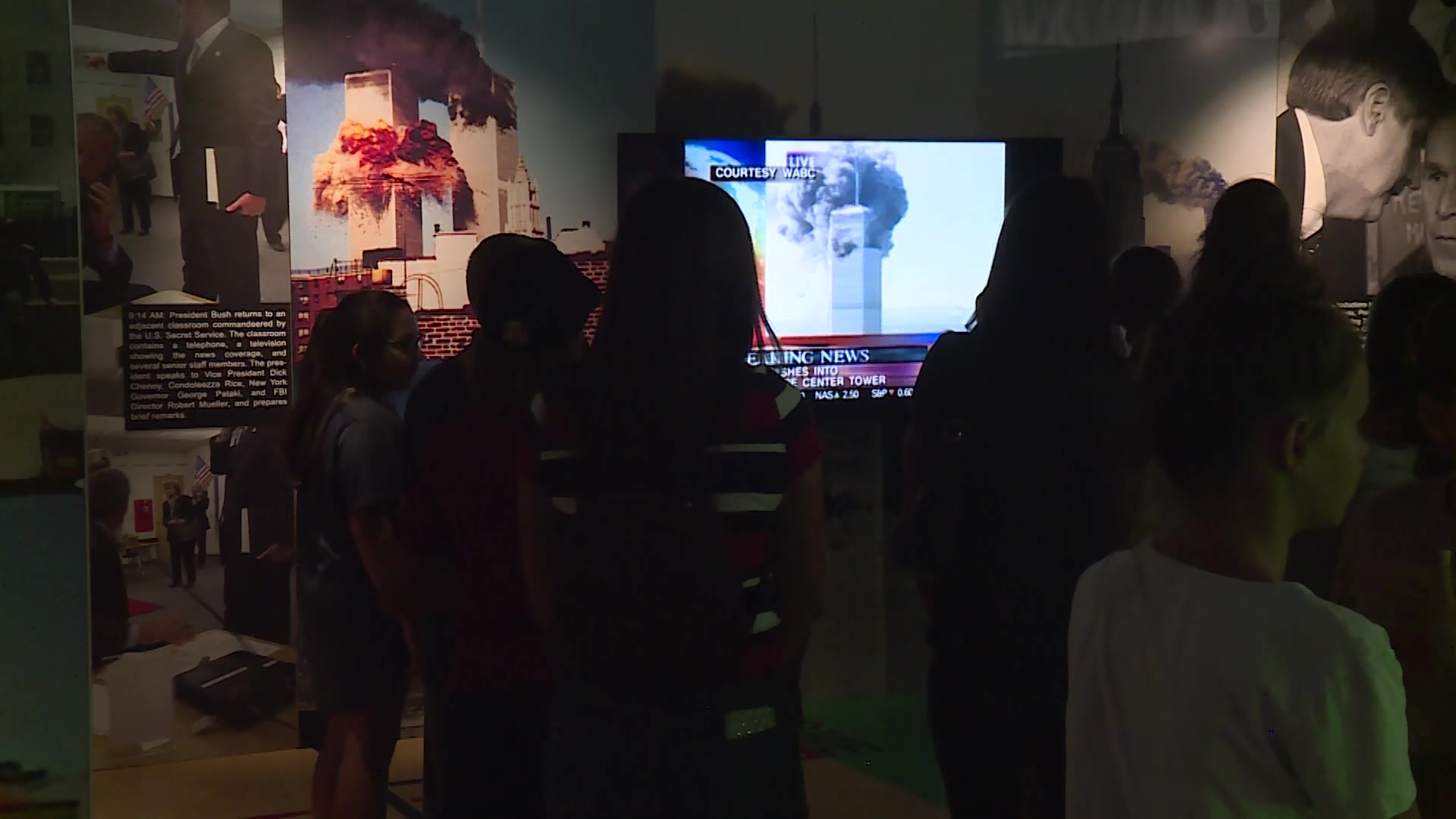 People viewing an old newscast showcasing the twin towers and 9/11. (KSL TV)...