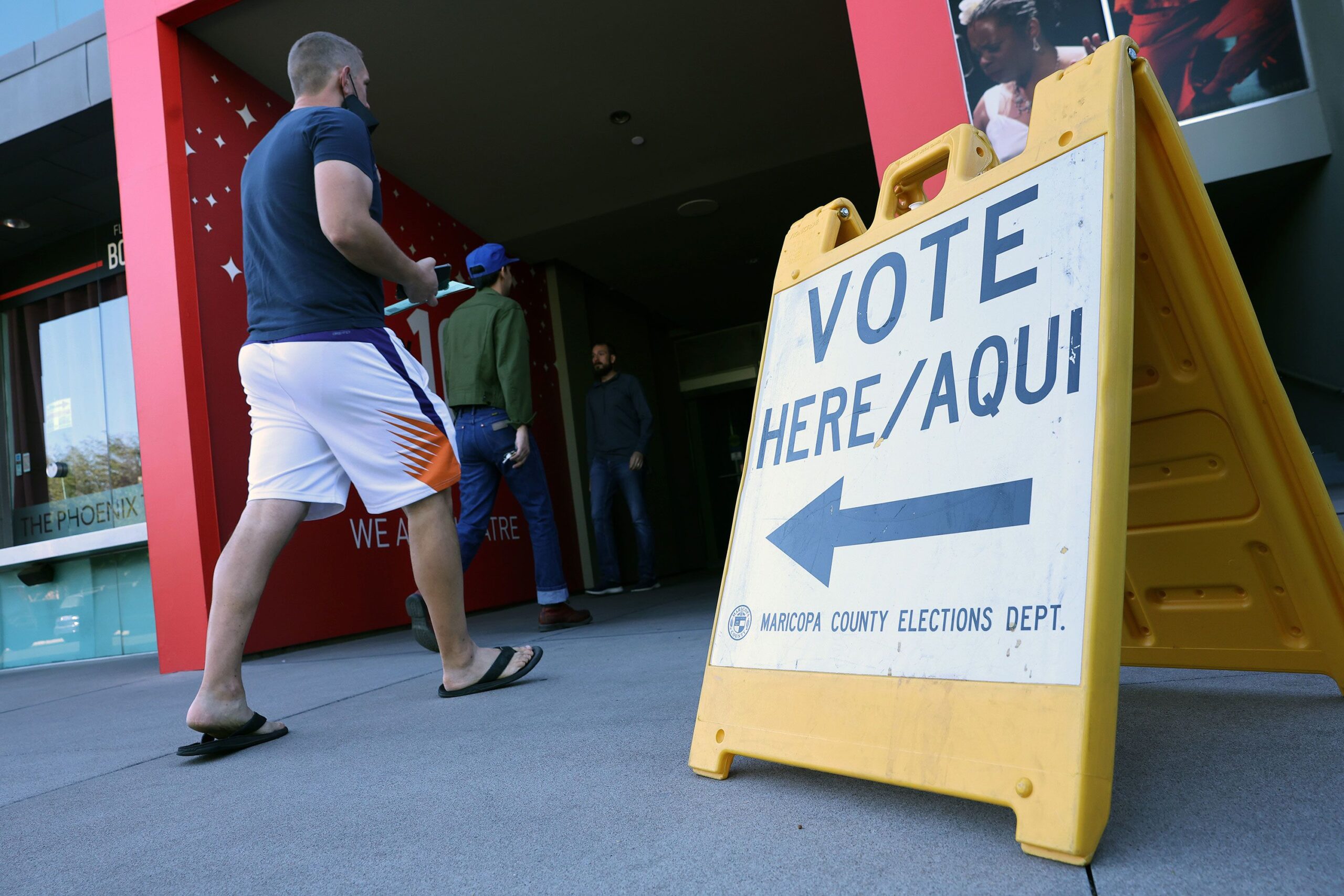 Voters arrive to cast their ballots at the Phoenix Art Museum on November 8, 2022. (Kevin Dietsch/G...