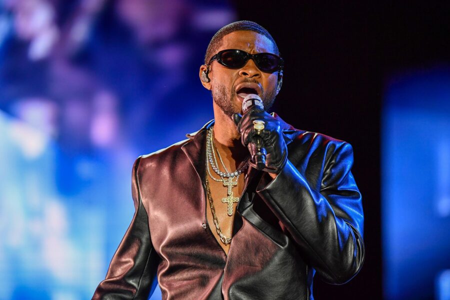 Usher performs onstage during the Lovers & Friends music festival at the Las Vegas Festival Grounds...