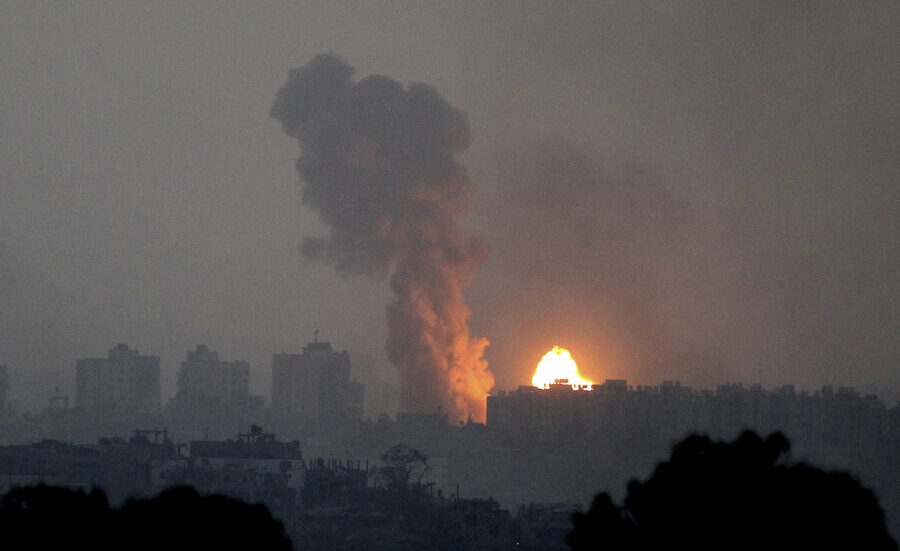 Fire and smoke rise following an Israeli airstrike in the Gaza Strip, as seen from southern Israel,...
