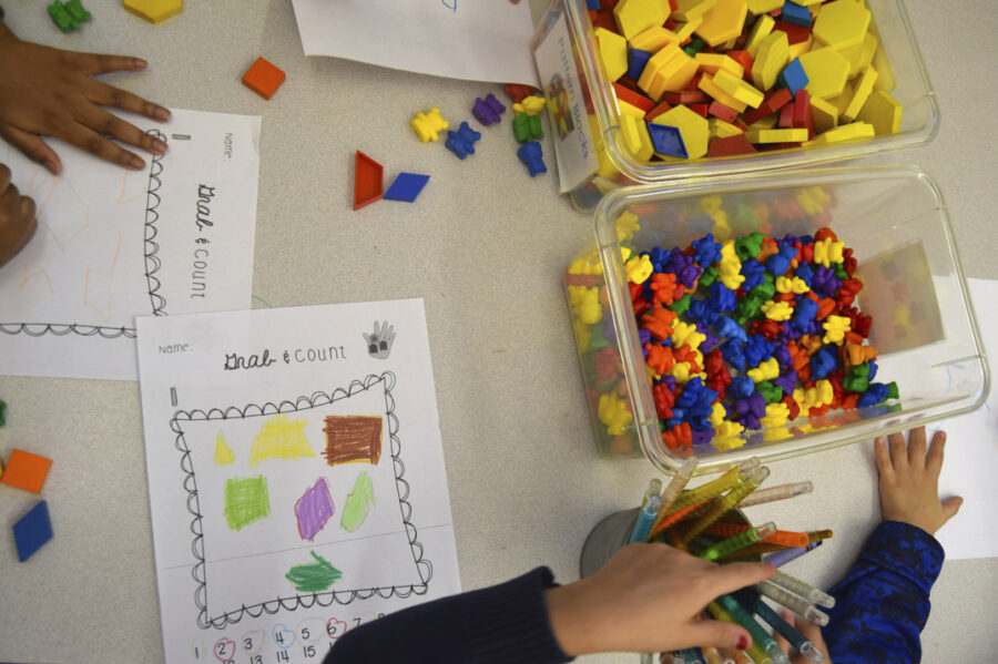 Preschool students practice math using manipulatives at a public school in Boston in 2016. Experts ...