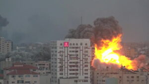 An air strike hitting Israel causing a massive explosion.