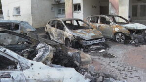 Destroyed cars on the streets of Israel after the missile attack. 