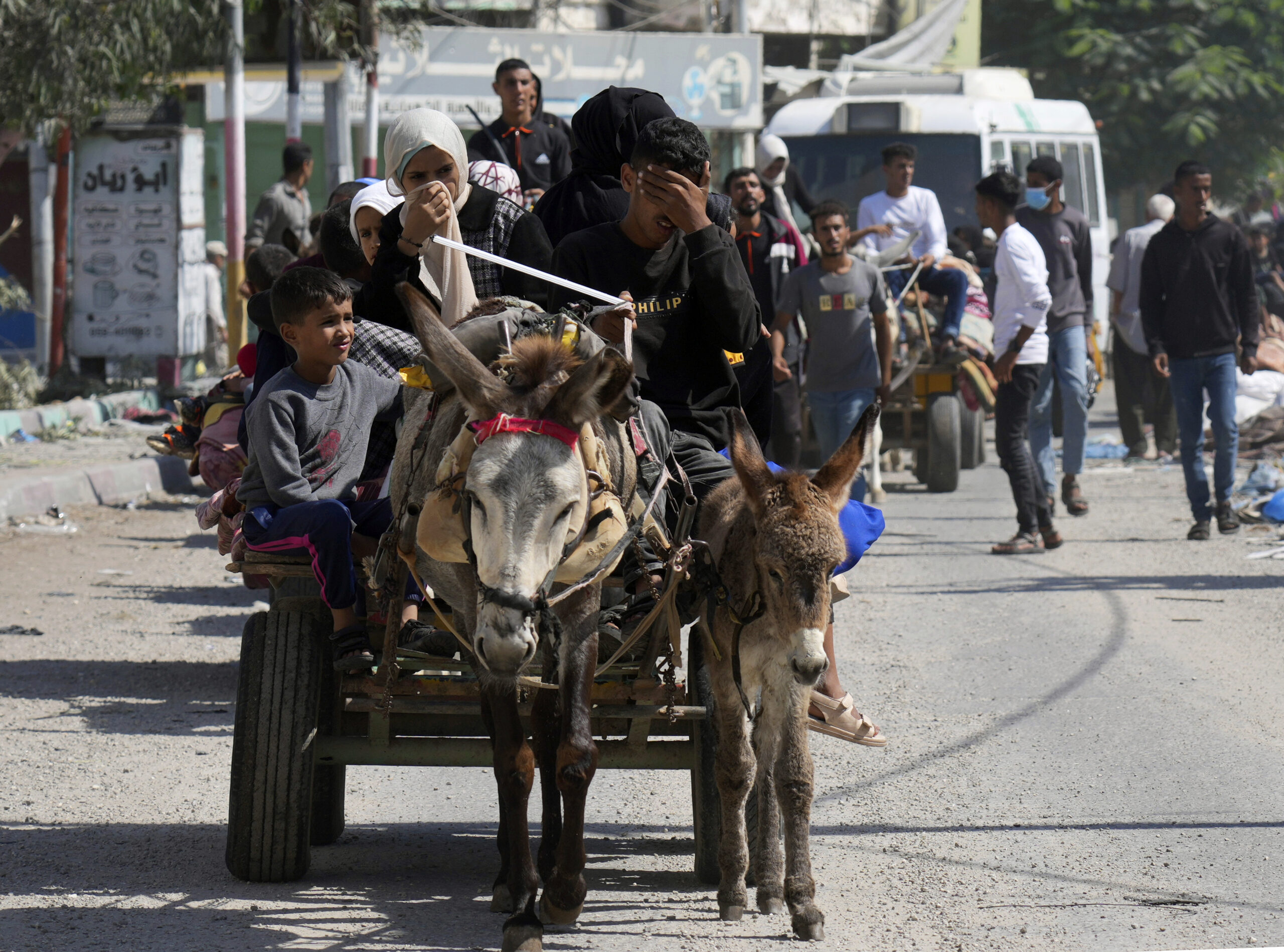 Palestinians flee from northern Gaza to the south after the Israeli army issued an unprecedented ev...