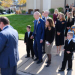 President Henry B. Eyring, Second Counselor in the First Presidency of The Church of Jesus Christ of Latter-day Saints, and family members watch the loading of the casket following the funeral for his wife, Sister Kathleen Eyring, on Saturday, October 21, 2023. (©2023 Intellectual Reserve, Inc. All rights reserved.)