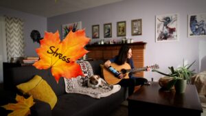 Rachel Lam playing her guitar.