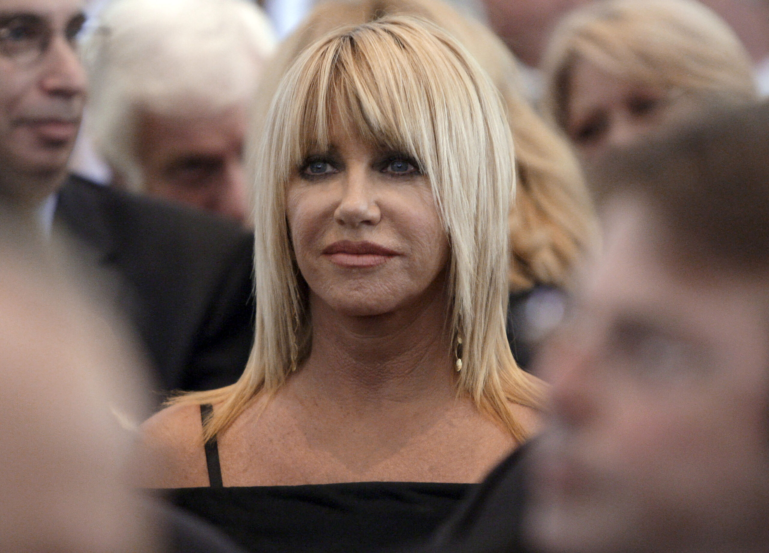 FILE - Suzanne Somers is seen during the funeral services for Merv Griffin at the Church of the Goo...
