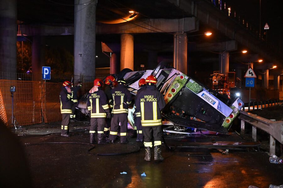 Firefighters work on the site of a bus accident on October 3 in Mestre, near Venice.
Mandatory Cred...