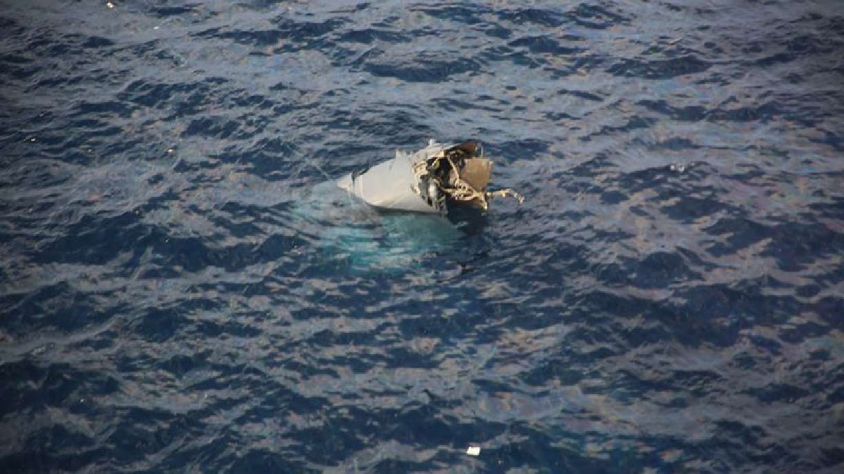 In this photo provided by Japan Coast Guard, debris believed to be from a U.S. military Osprey airc...
