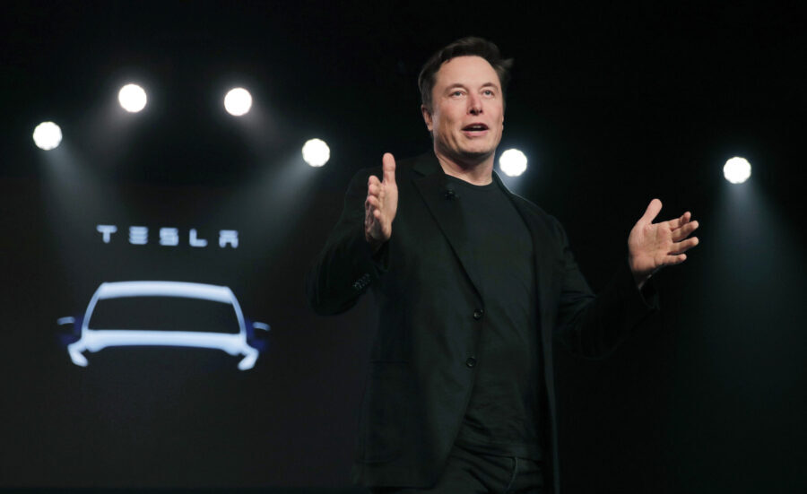 FILE- Tesla CEO Elon Musk speaks before unveiling the Model Y at Tesla's design studio March 14, 20...