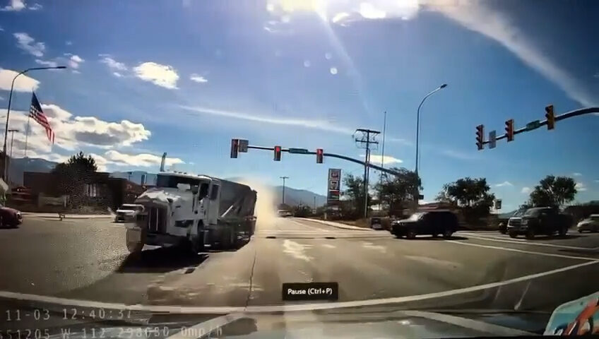 Dash camera video of a driver almost getting hit by the out of control semi that crashed into the a...