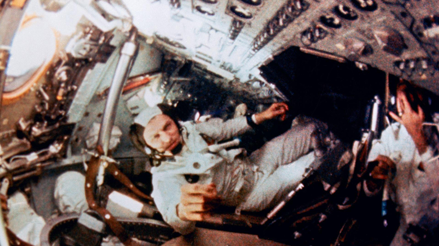 Astronaut Frank Borman, mission commander, is shown during intravehicular activity (IVA) on the Apo...