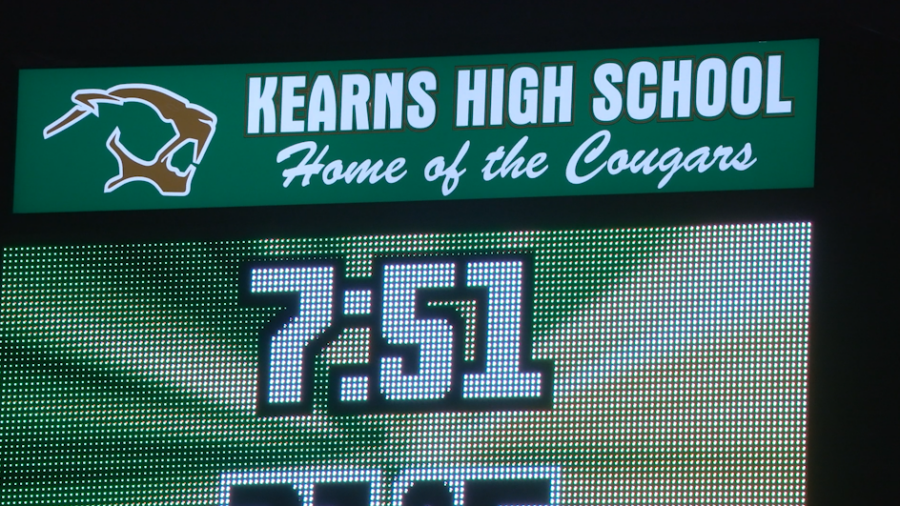 Board with Kearns High School name...