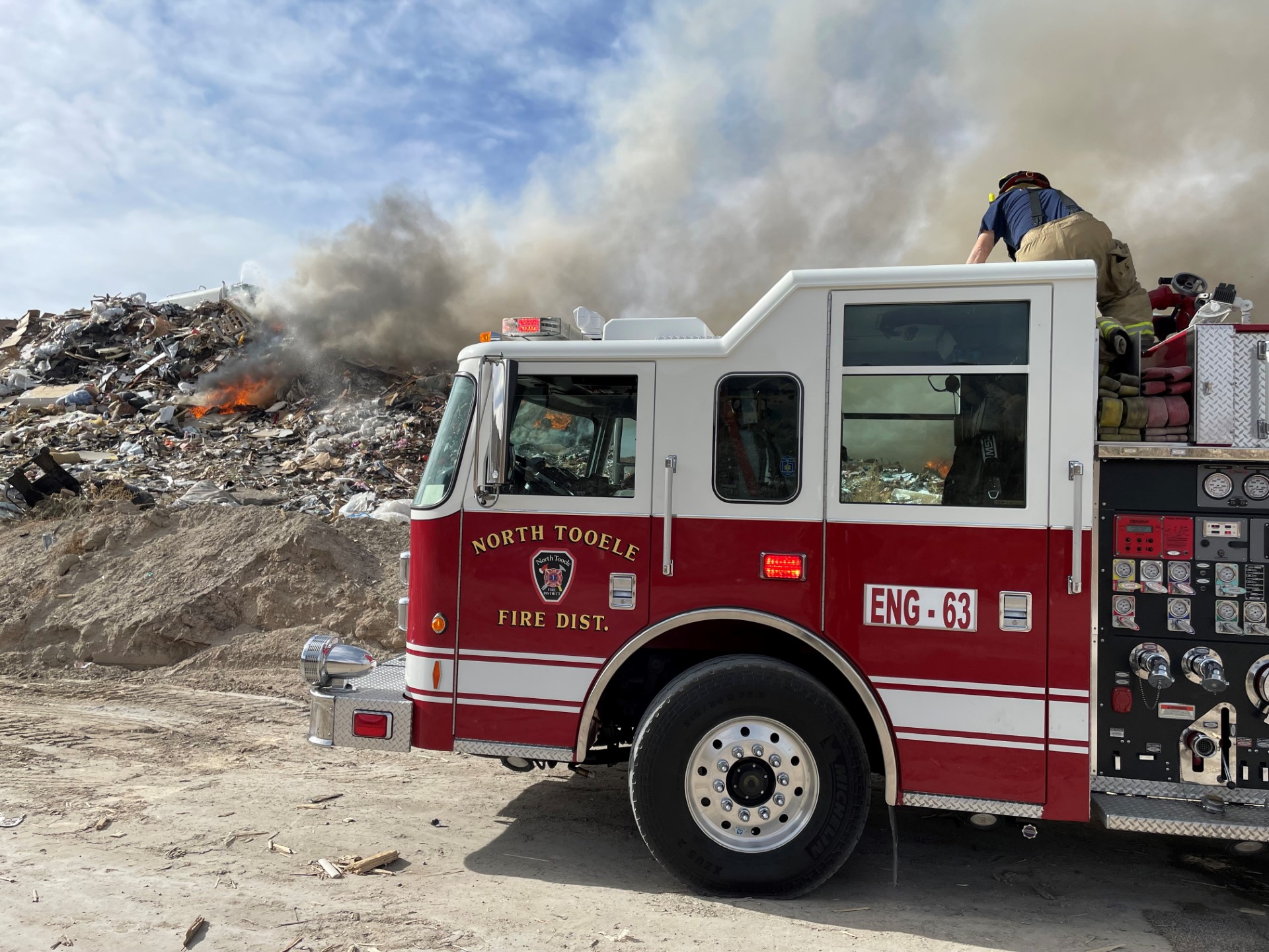Crews with the North Tooele Fire District have been battling a landfill fire for most of Monday. (N...