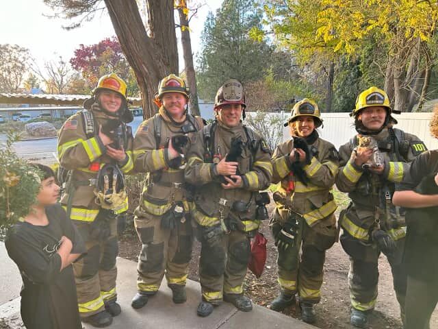 Unified Fire firefighters with the rescued kittens. (Unified Fire Authority)...