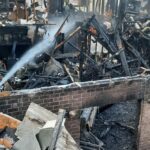 Updated photos of the fire provided on Sunday morning as crews continued to extinguish smoldering rubble. (Mountain Green Fire Protection District) 