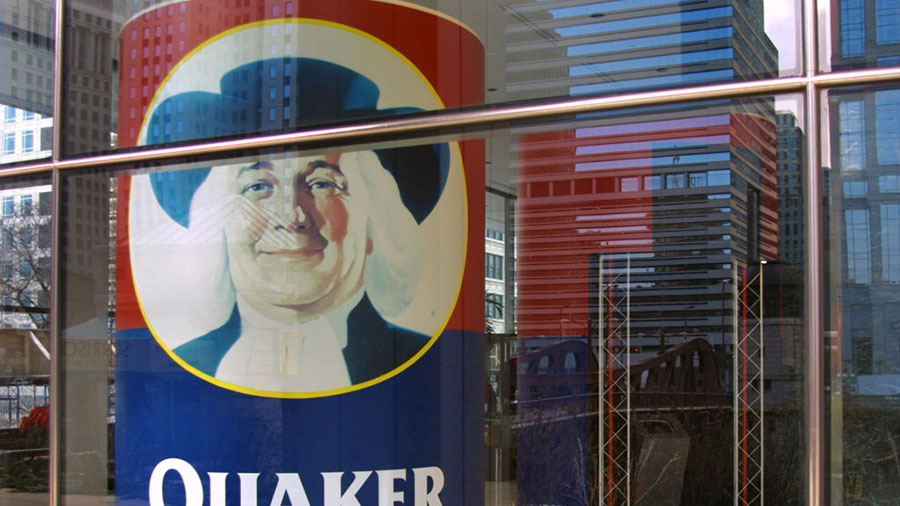 A large box of Quaker Oats is displayed in a first-floor lobby window December 4, 2000 at Quaker''s...