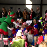 Kids being greeted by Santa's elves. (KSL TV) 
