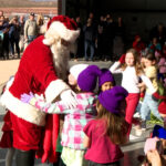 Santa delivering gifts to the kids. (KSL TV)