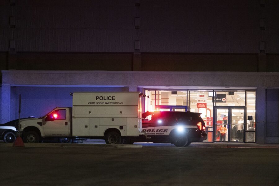 Colorado Springs Police Department investigators continue working the scene at Citadel Mall late Su...