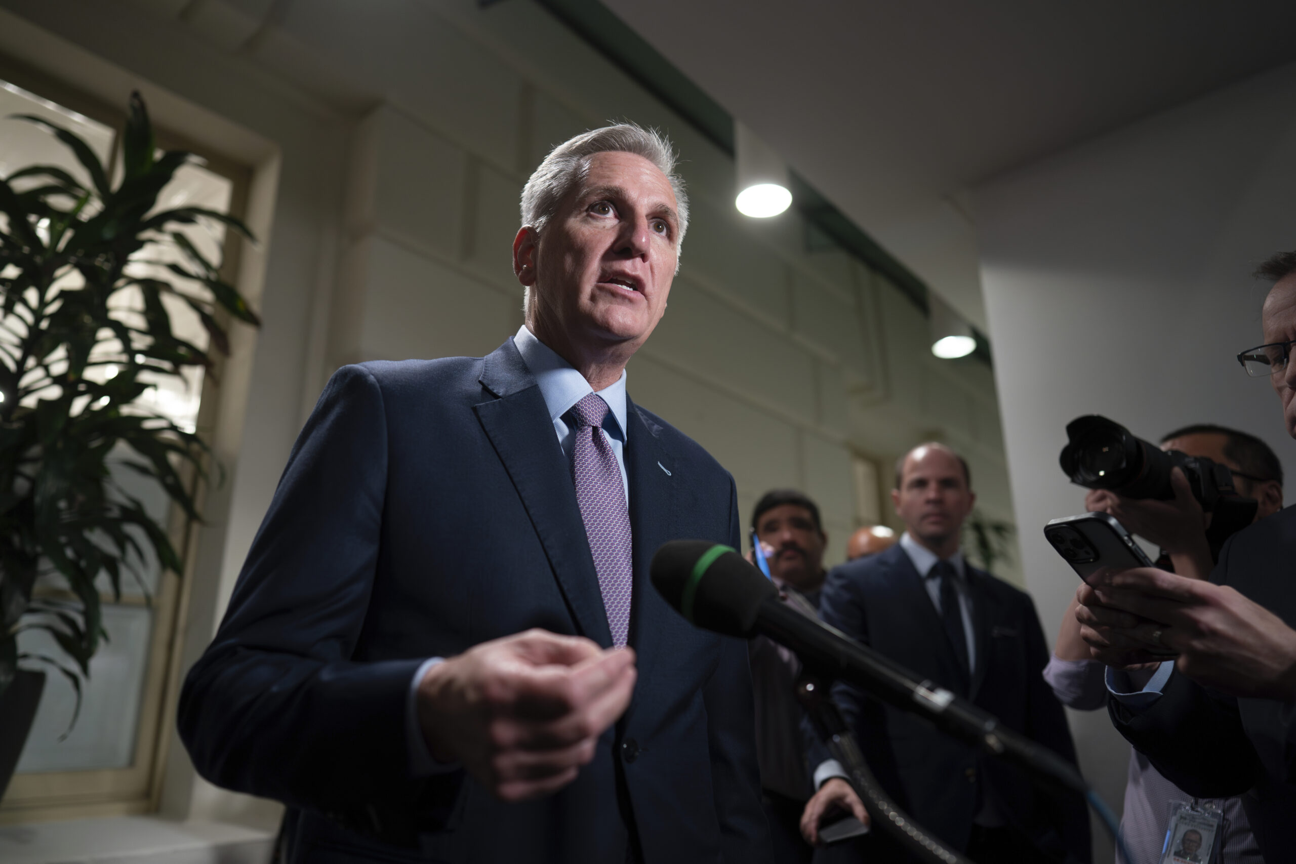 FILE - Speaker of the House Kevin McCarthy, R-Calif., talks to reporters after a closed-door meetin...