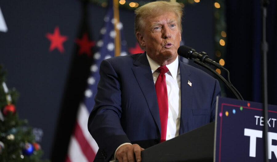 FILE - Former President Donald Trump speaks during a commit to caucus rally, Tuesday, Dec. 19, 2023...