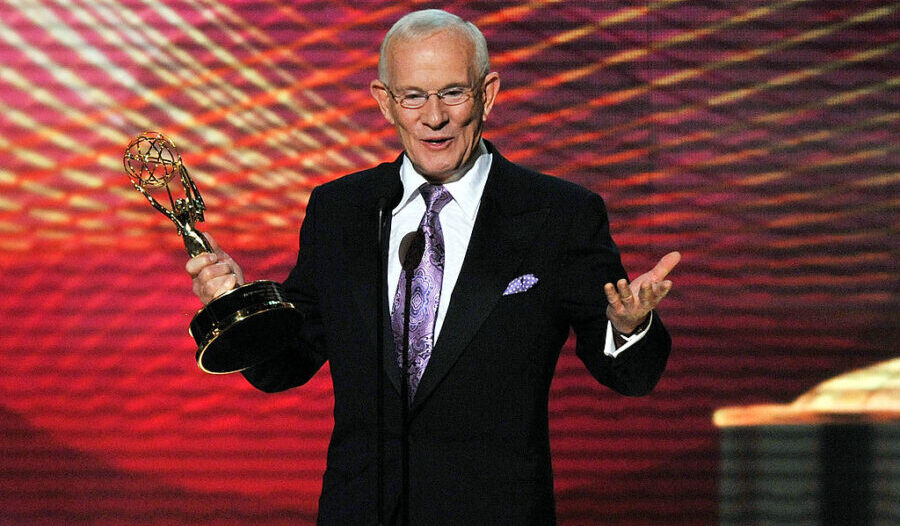 LOS ANGELES, CA - SEPTEMBER 21:  Writer/Actor Tommy Smothers accepts a commemorative Emmy writing a...