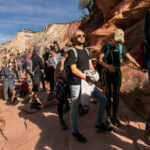 FILE — Hikers waiting to climb near Angels Landing in Zion National Park. (Lizz Eberhardt, NSP)