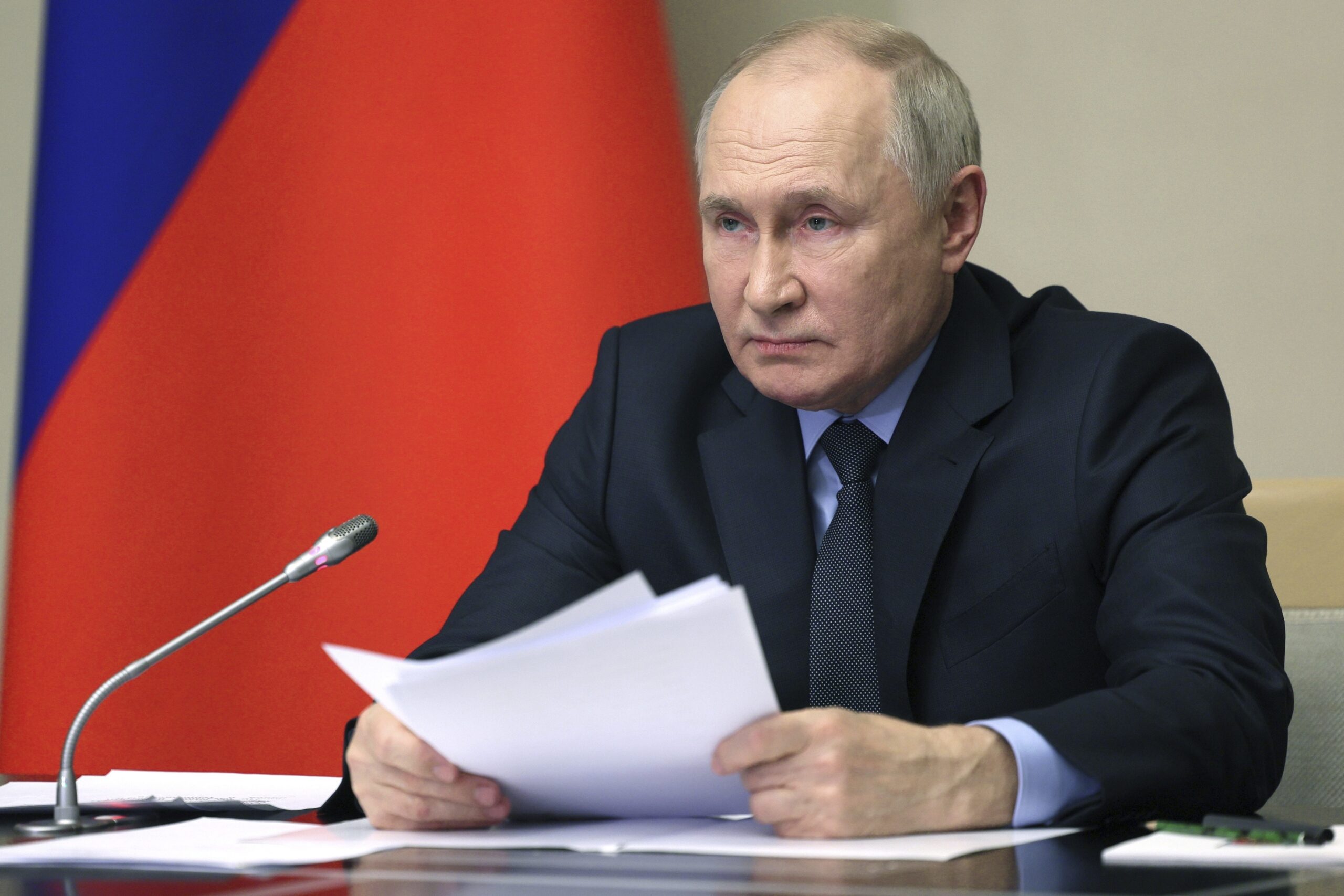 FILE - Russian President Vladimir Putin leads the meeting with top security and law enforcement off...
