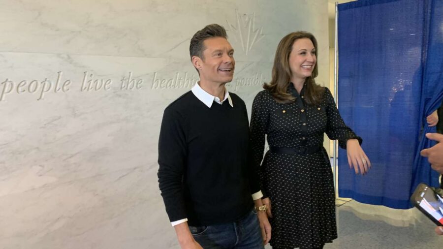 Ryan Seacrest and his sister Meredith Seacrest Leach speak with reporters before the opening of the...