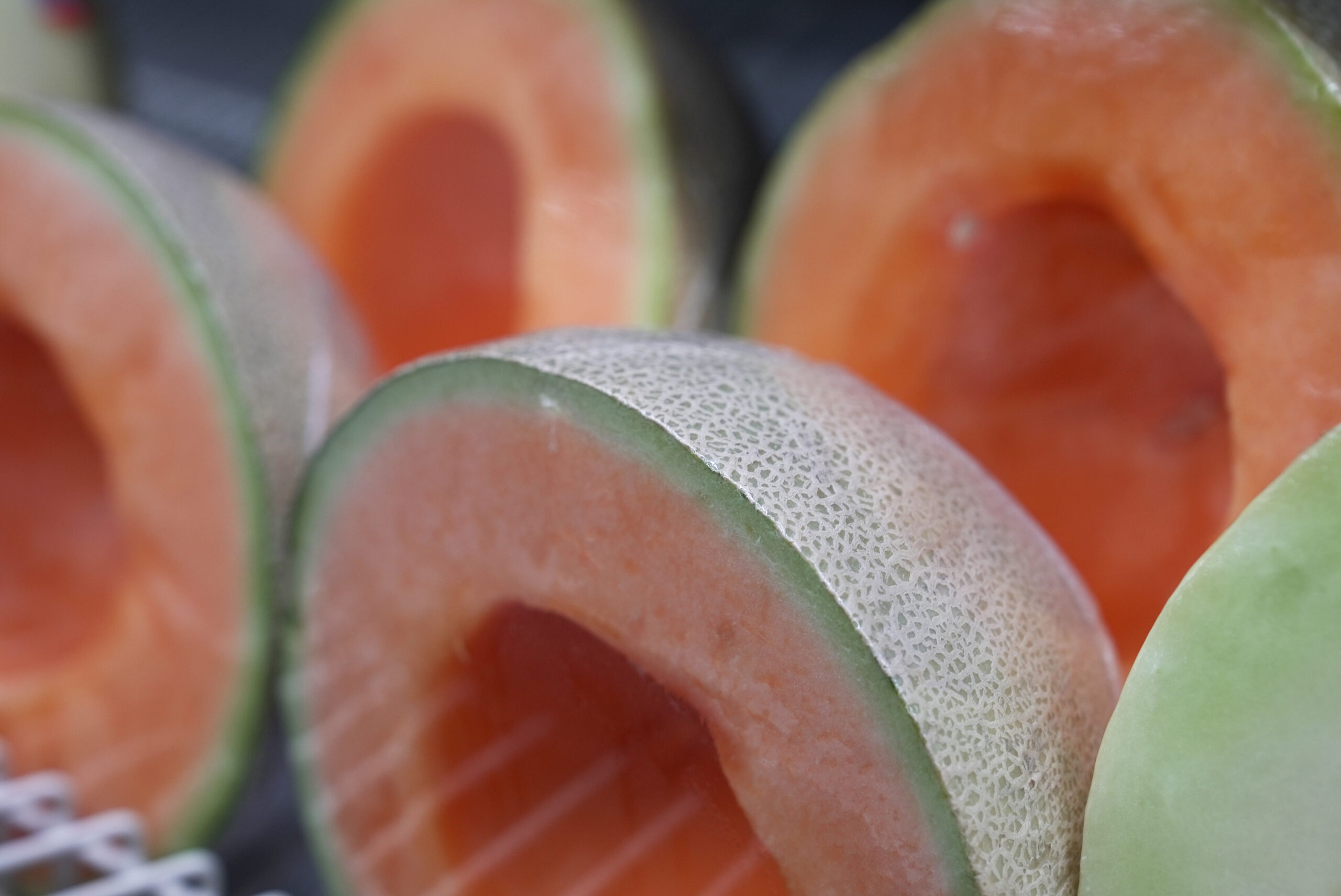 Cantaloupe halves are displayed for sale at a supermarket in New York on Tuesday, Dec. 12, 2023. In...